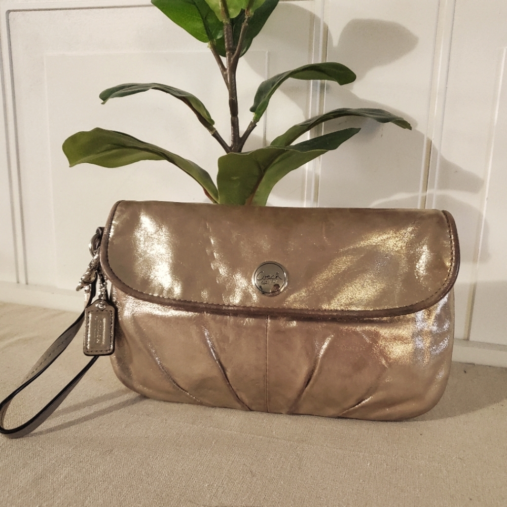 COACH - Metalic Gold Wristlet w/Purple Lining